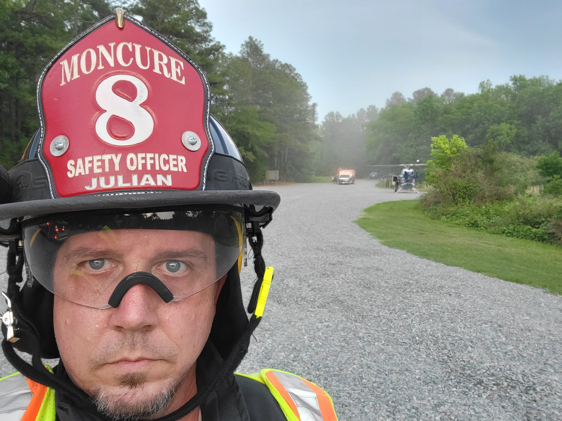 Jere Julian as safety officer on scene as a medical helicopter lands in the background